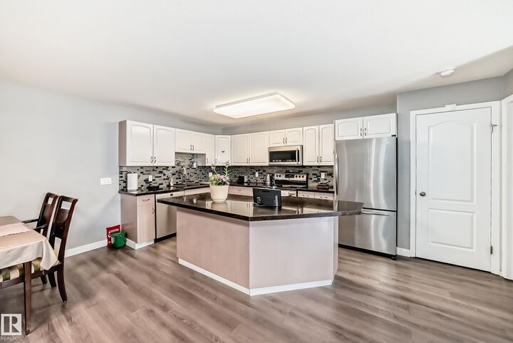 Property Photo:  10421 42 Avenue NW 119  AB T8J 7C8 