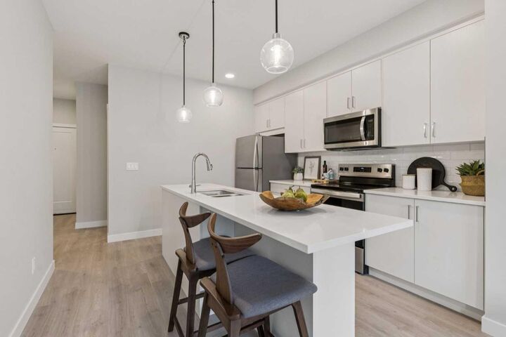 Property Photo: 655 Shawnee Square SW 201 AB T2Y 1E3