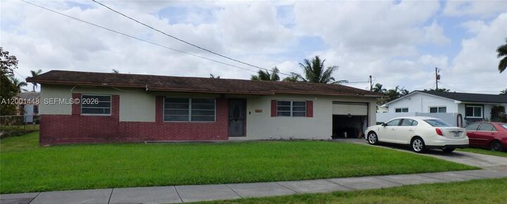 Property Photo: 11000 NW 21st Ct FL 33167