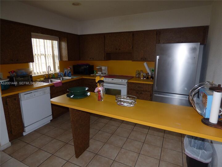 Property Photo:  11000 NW 21st Ct  FL 33167 