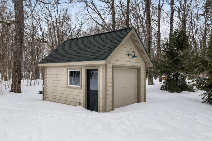 Property Photo:  6598 Forest Way  MI 49740 