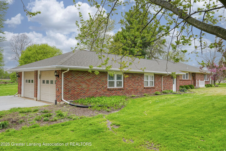 Property Photo:  3604 S Dewitt Road  MI 48879 