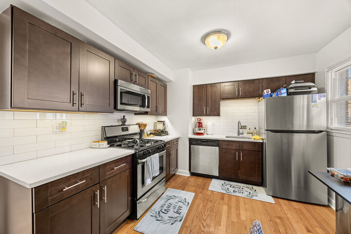 Property Photo:  9030 Kenton Avenue  IL 60076 