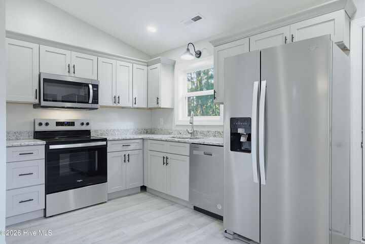 Property Photo:  213 Village Drive  NC 28546 