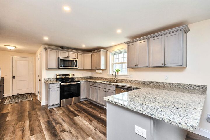 Property Photo:  117 Timber Ridge Drive  NH 03055 