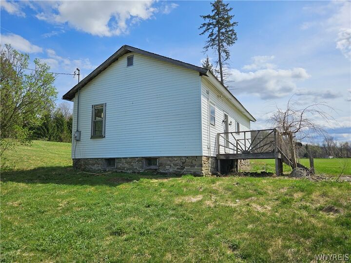 Property Photo:  7829 Jersey Hollow Road  NY 14755 