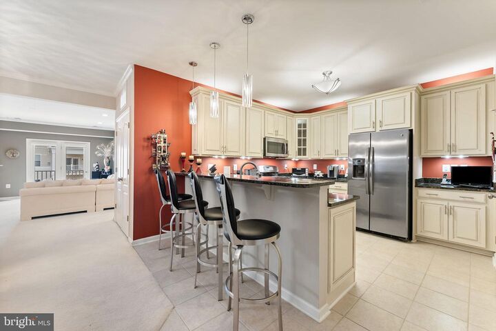 Property Photo:  24661 Woolly Mammoth Terrace 403  VA 20105 