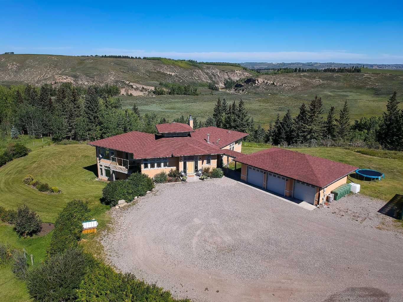 Property Photo: 254069 Towers Trail AB T4C 2A3