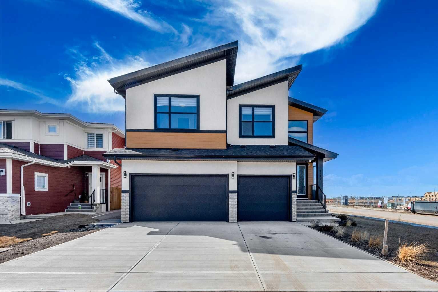 Property Photo: 1001 Waterford Drive SE AB T1X 2T7
