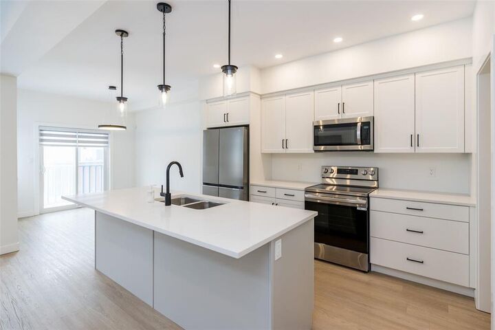 Property Photo:  295 Evelyne Reese Boulevard  MB R3X 2G1 