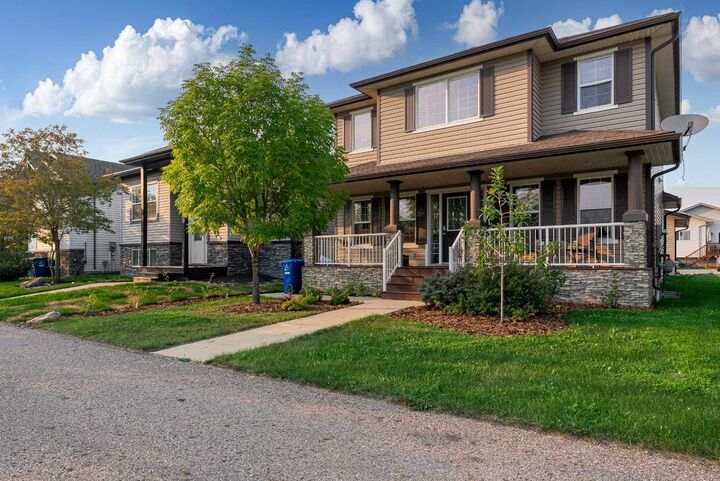 Property Photo:  203 Loutit Road  AB T9K 0L6 
