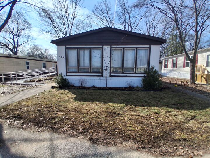Property Photo:  583 S McIntosh Lane  MI 49442 