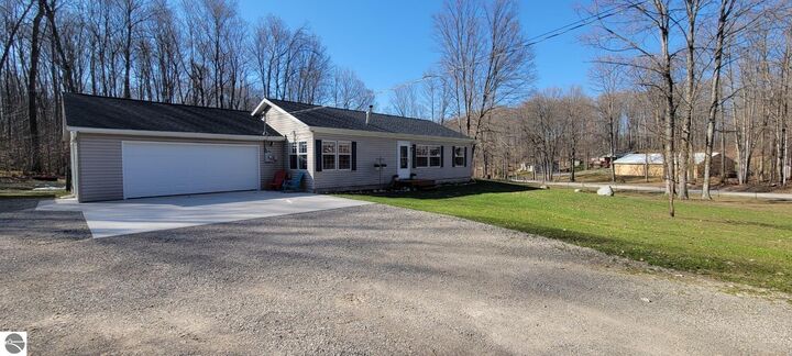 Property Photo:  4896 Oslund Road  MI 49659 