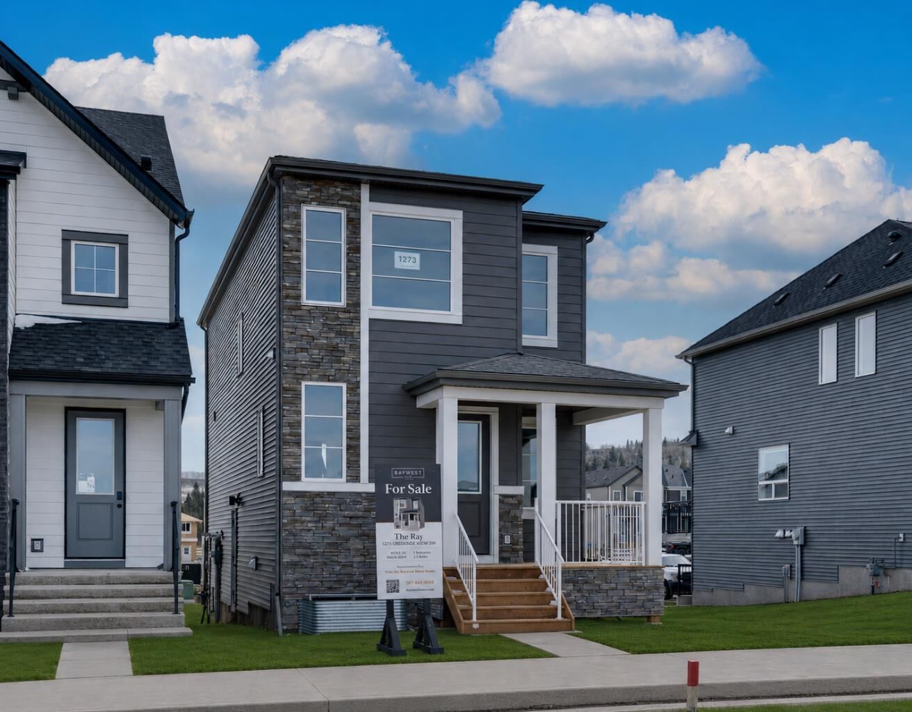 Property Photo: 1273 Creekview Drive SW AB T2X 5Y7