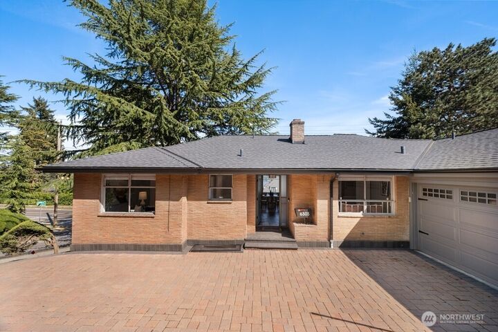 Property Photo:  6303  Wilson Avenue S  WA 98118 