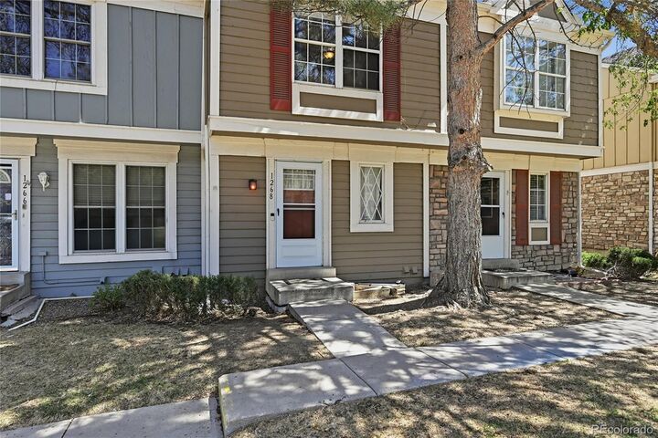 Property Photo:  1268 S Idalia Street  CO 80017 