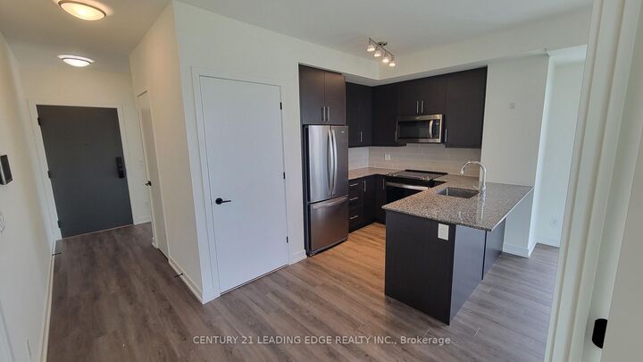 Property Photo:  345 Wheat Boom Drive 1003  ON L6H 7X4 