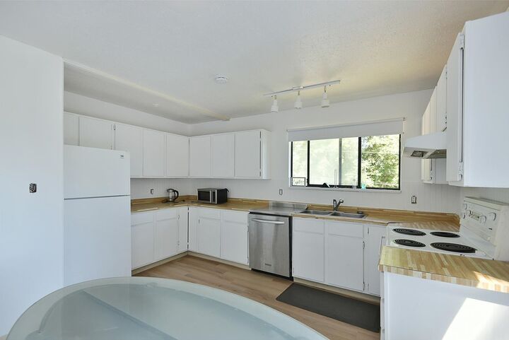 Property Photo:  5727 Trail Avenue  BC V7Z 0H8 