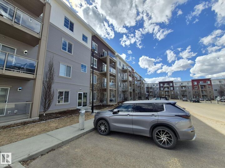 Property Photo: 812 Welsh Drive SW 303 AB T6X 1Y7