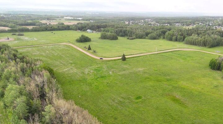 Property Photo: 4803 Mitchell Dr AB T7A 1V1