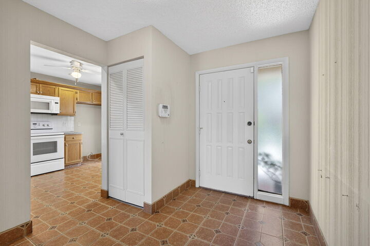 Property Photo:  67 Macadamia Court  FL 33411 