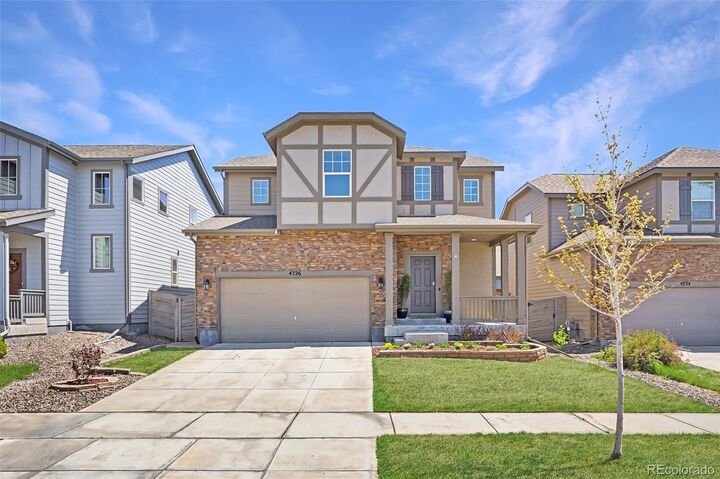 Property Photo:  4726 Hannibal Street  CO 80239 