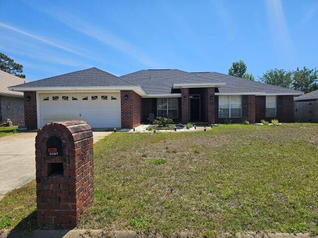 Property Photo:  2287 Heritage Circle  FL 32566 
