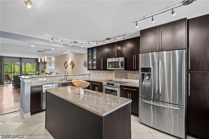 Property Photo:  5535 Rattlesnake Hamm Road 205  FL 34113 