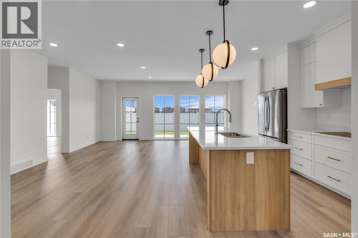 Property Photo:  6 720 Brighton Boulevard  SK S7V 1X1 