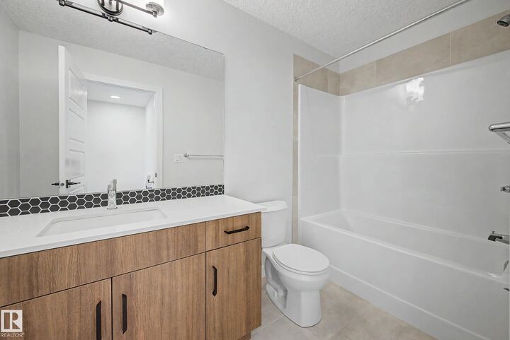 Property Photo: 6214 Cartmell Court SW 24 AB T6W 5A7