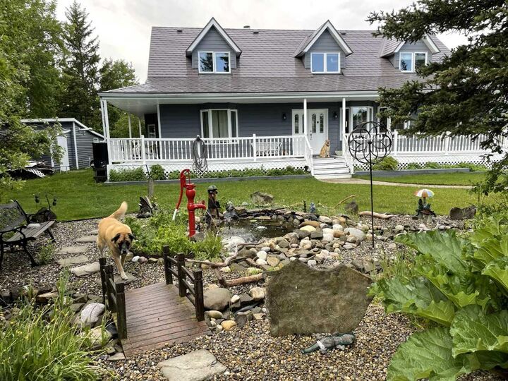 Property Photo: 273116 Grand Valley Road AB T4C 2W5