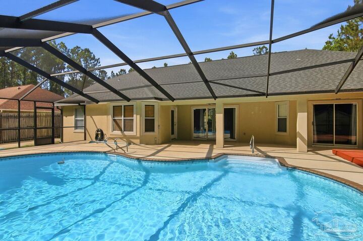 Property Photo:  7535 Corral Rd  FL 32583 