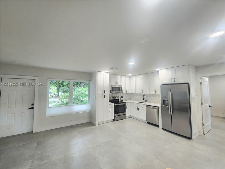 Property Photo:  141 NE 30th St  FL 33334 