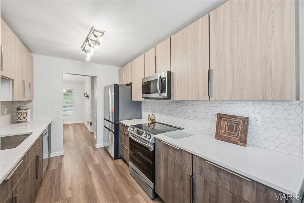 Property Photo:  48 Rue De Paix 39  MO 63367 