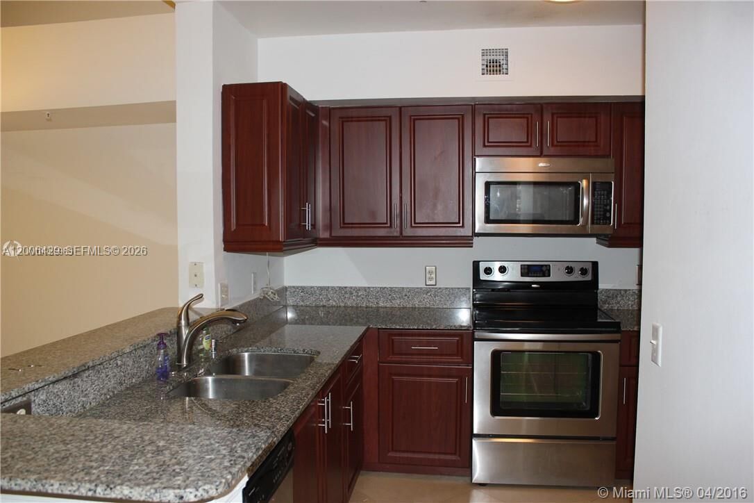 Property Photo:  2451 Centergate Dr 303  FL 33025 