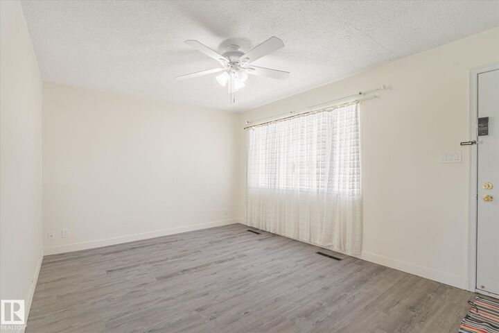 Property Photo:  10531 128 Avenue NW  AB T5E 0J2 
