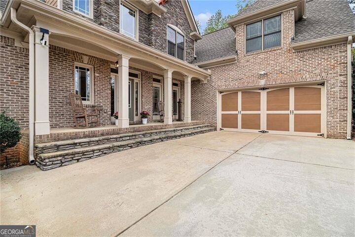 Property Photo:  7497 Treehouse Court  GA 30135 