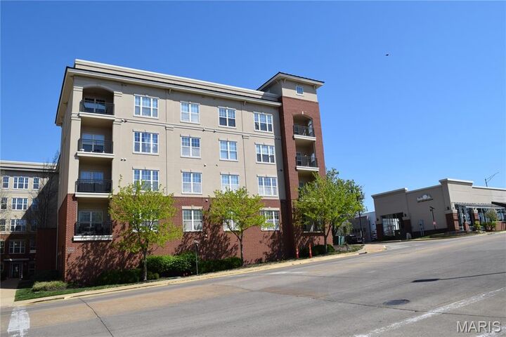 Property Photo:  1241 Strassner Drive 1401  MO 63144 