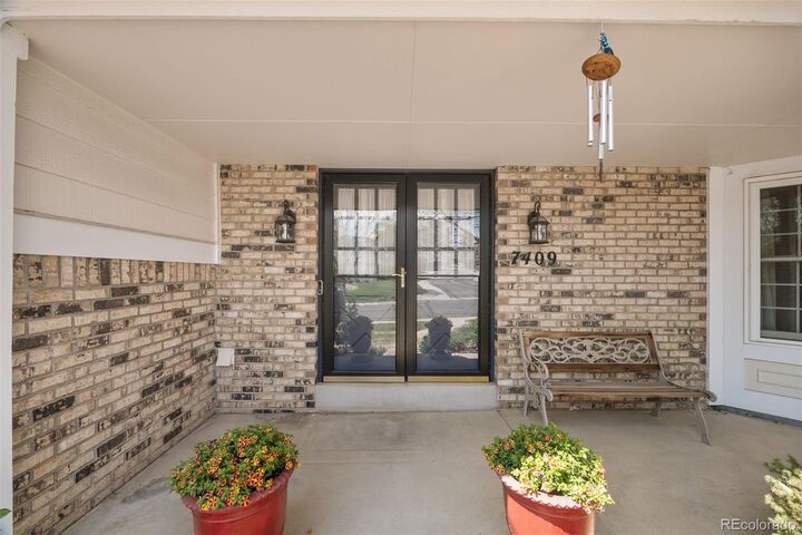 Property Photo:  7409 S Newport Way  CO 80112 