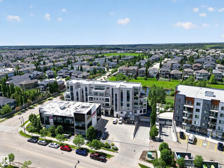 Property Photo:  1350 Windermere Way SW 408  AB T6W 2J3 