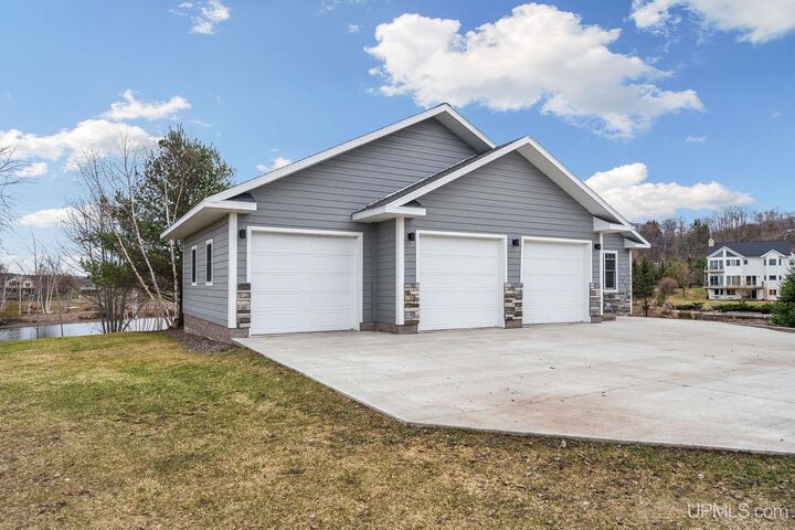 Property Photo:  4017 Mariner Court  MI 49931 