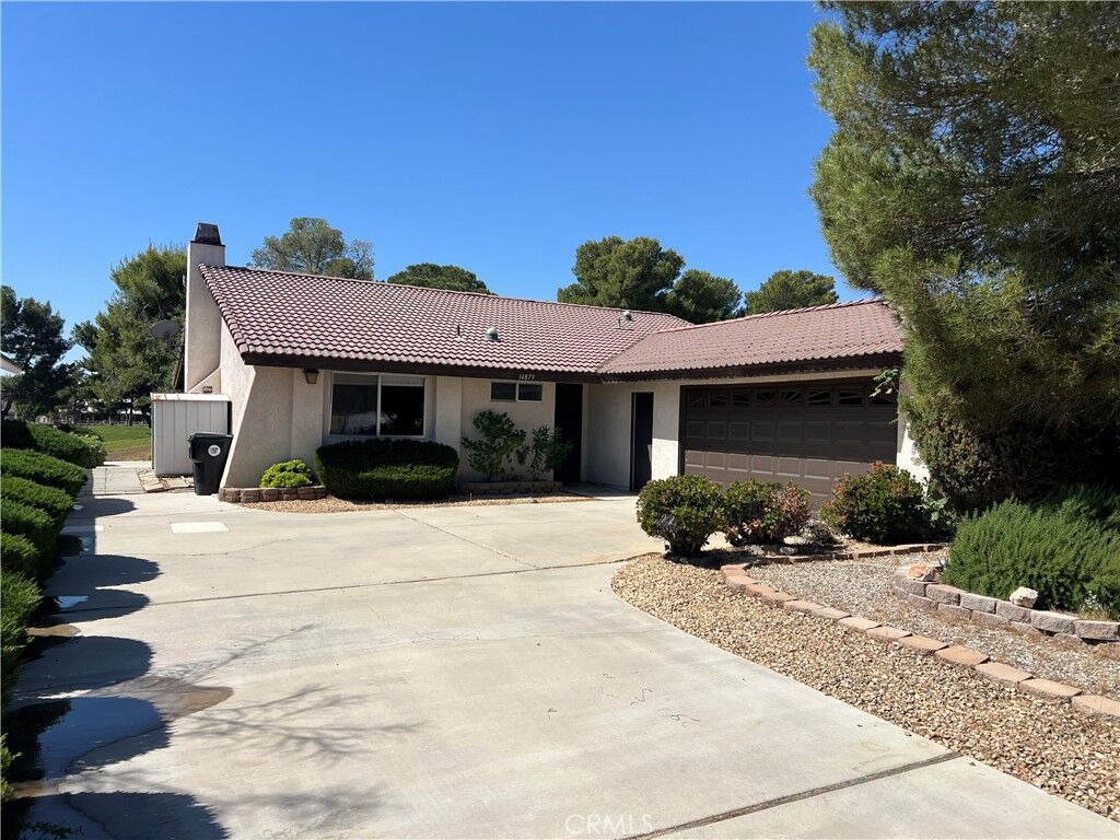Property Photo:  14879 Tournament  CA 92342 