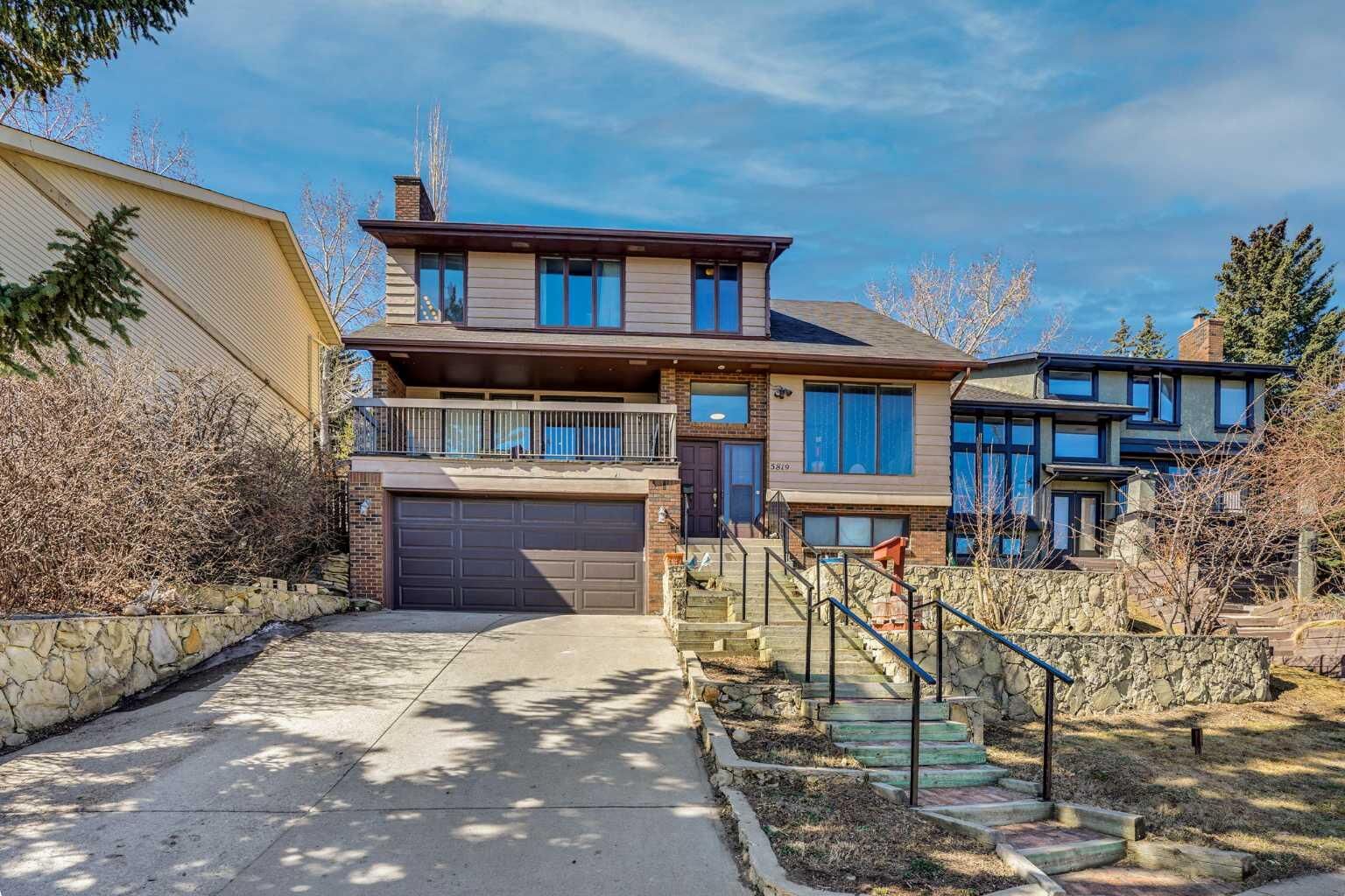 Property Photo: 5819 Coach Hill Road SW AB T3H 1E3
