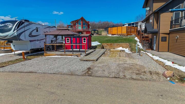 Property Photo:  25054 South Pine Lake Road 6080  AB T0M 1R0 