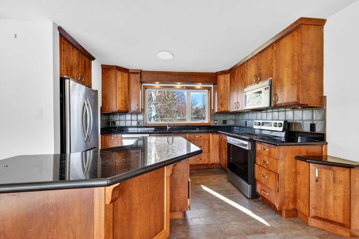 Property Photo:  16 Heston Street NW  AB T2K 2C1 