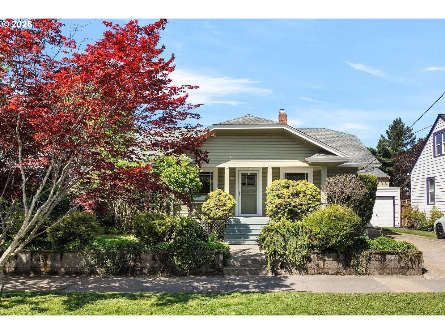 Property Photo:  303 SE 86th Ave  OR 97216 