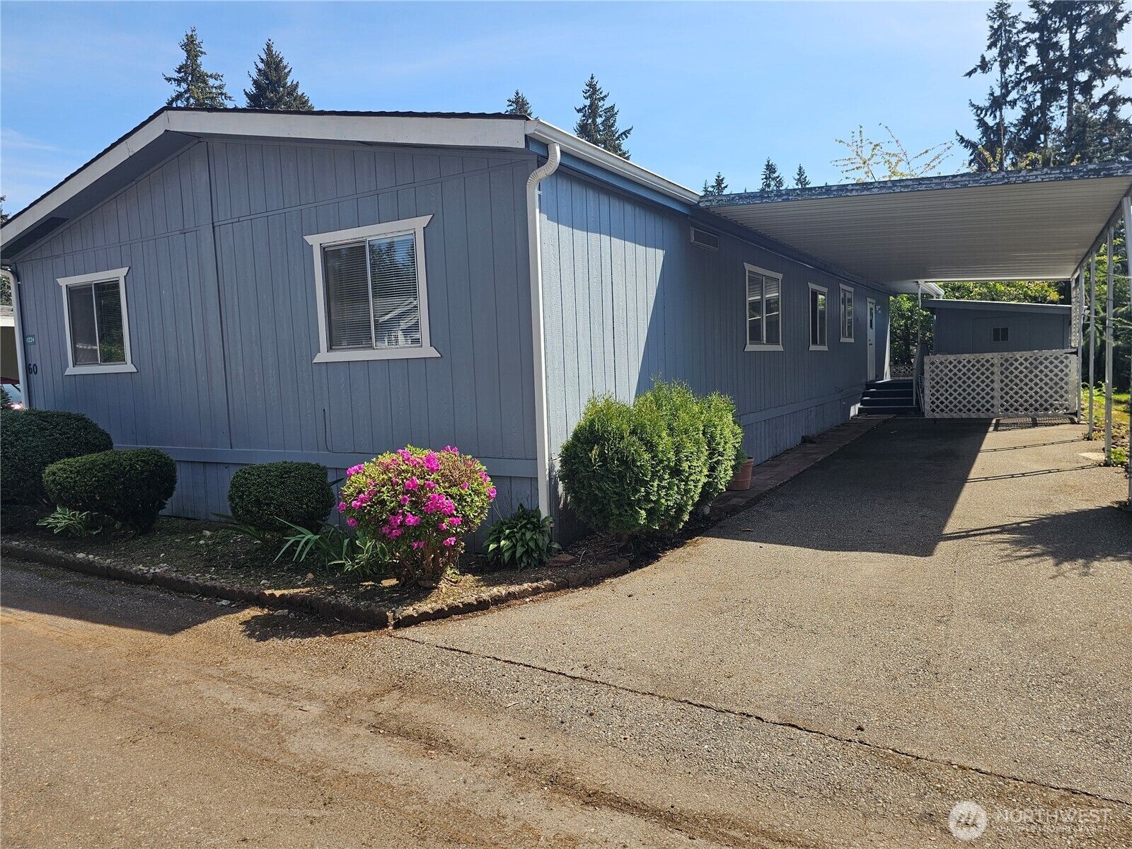 Property Photo:  11224  124th Street Ct E 60  WA 98374 