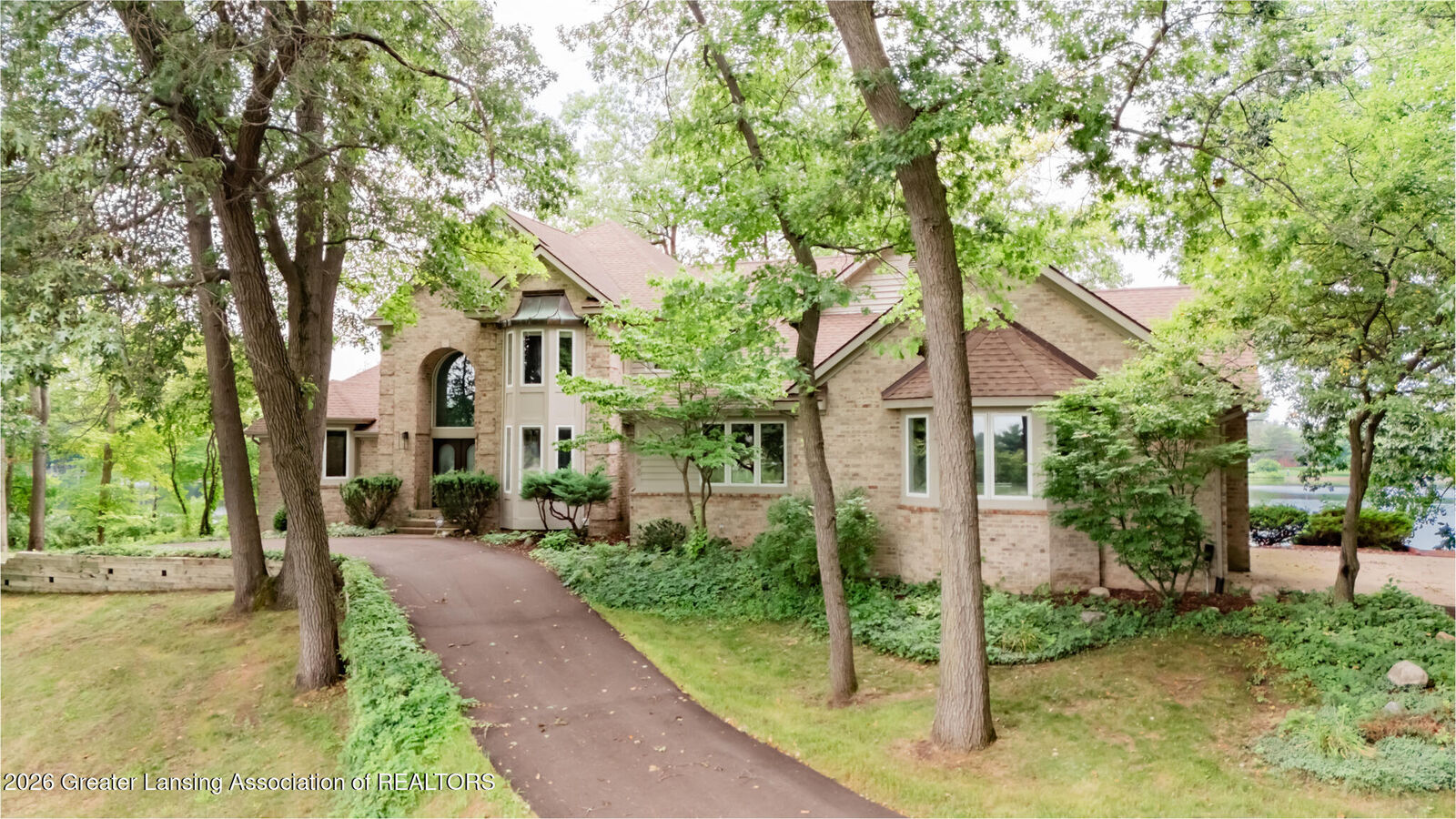 Property Photo:  10082 Oak Island Drive  MI 48848 