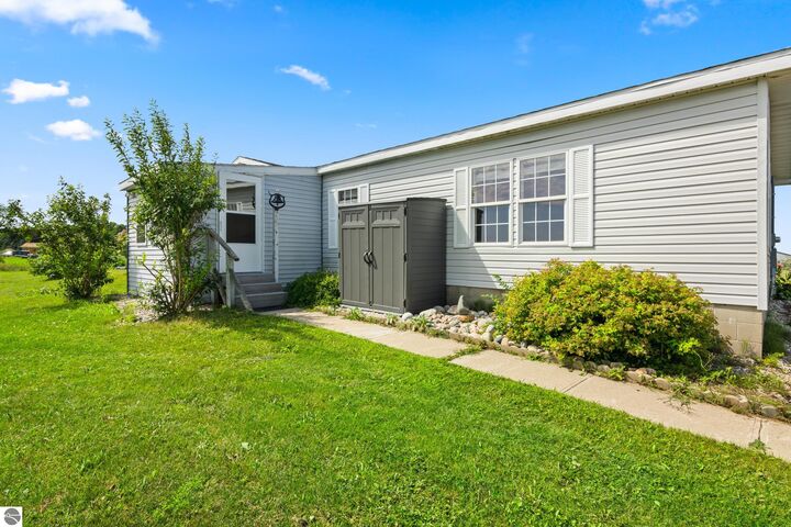 Property Photo:  4433 Hamlin Road  MI 49637 