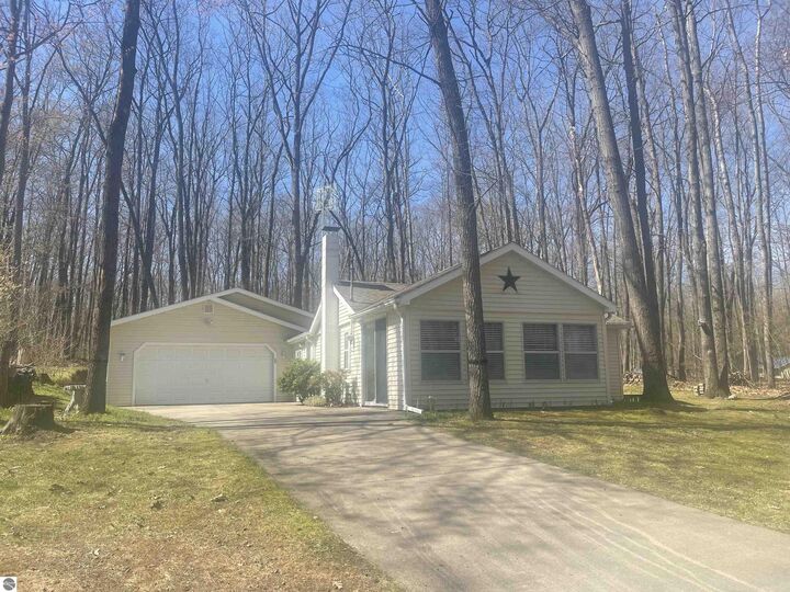 Property Photo:  742 Bungo Lake Road  MI 48625 